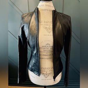 Danier Black Leather Jacket. Very sleek design. Size XXS.